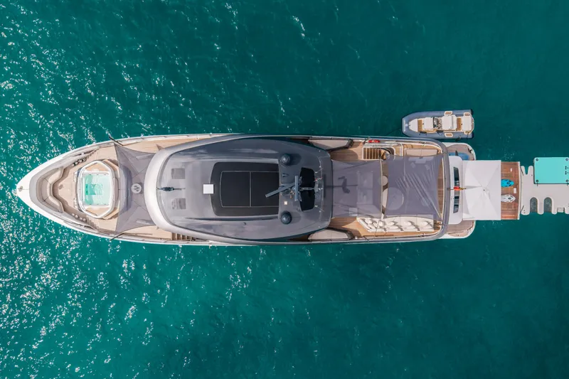 Slide: The Image of Aerial view of 2023 Princess X95 yacht on turquoise water, showcasing luxury design. - 27