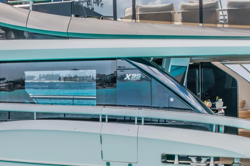 Slide: The Image of 2023 Princess X95 luxury yacht with sleek design and modern amenities. - 29