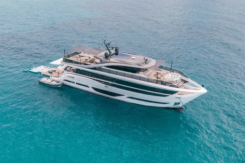 Slide: The Image of Luxurious 2023 Princess X95 yacht cruising on clear blue ocean waters. - 32