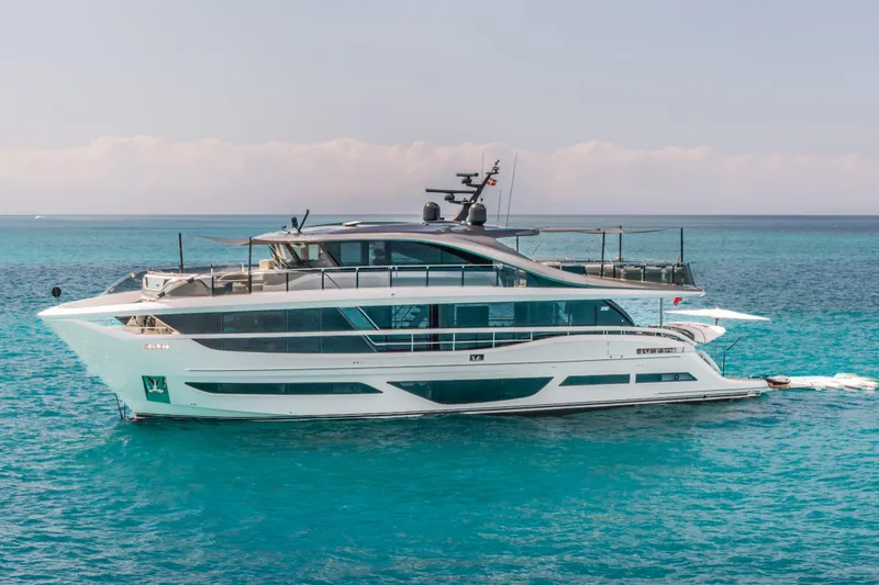 Slide: The Image of 2023 Princess X95 yacht cruising on clear blue ocean waters. - 34