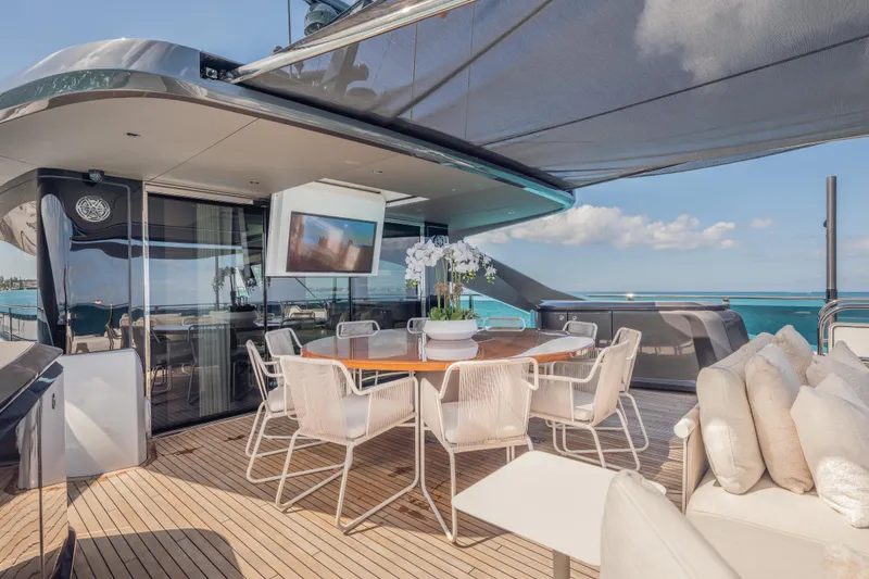 Slide: The Image of Luxurious 2023 Princess X95 yacht deck with elegant dining area and ocean view. - 37