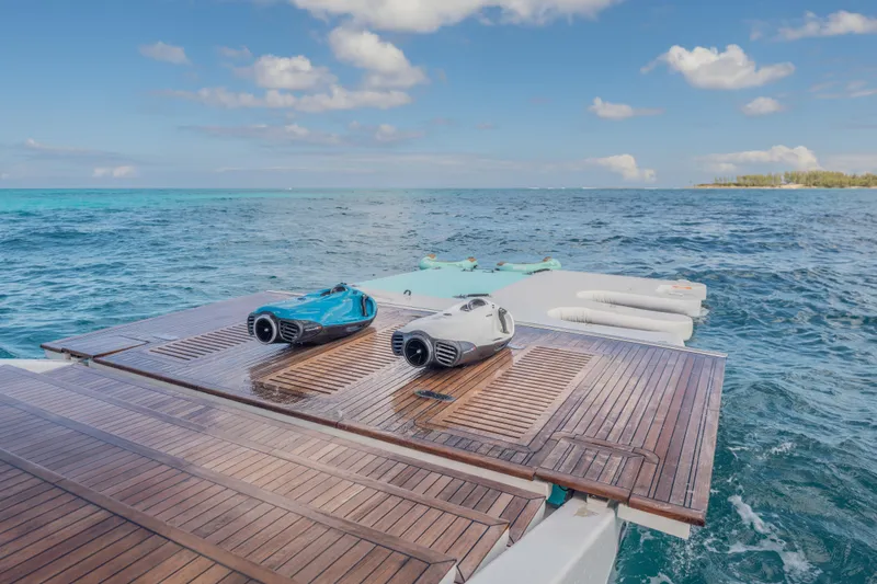 Slide: The Image of Luxury yacht Princess X95 deck with sea scooters, 2023 model, ocean view. - 41