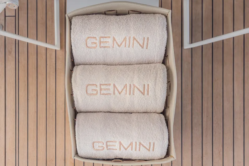 Slide: The Image of Luxurious towels labeled "GEMINI" on Princess X95 yacht deck, 2023 model. - 43