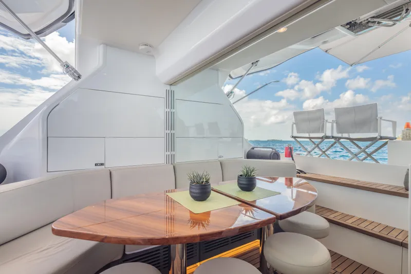 Slide: The Image of Luxurious 2023 Princess X95 yacht interior with elegant seating and ocean view. - 44