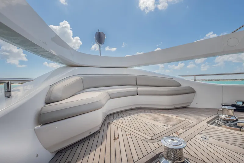 Slide: The Image of Luxurious seating area on 2023 Princess X95 yacht deck under clear blue sky. - 57