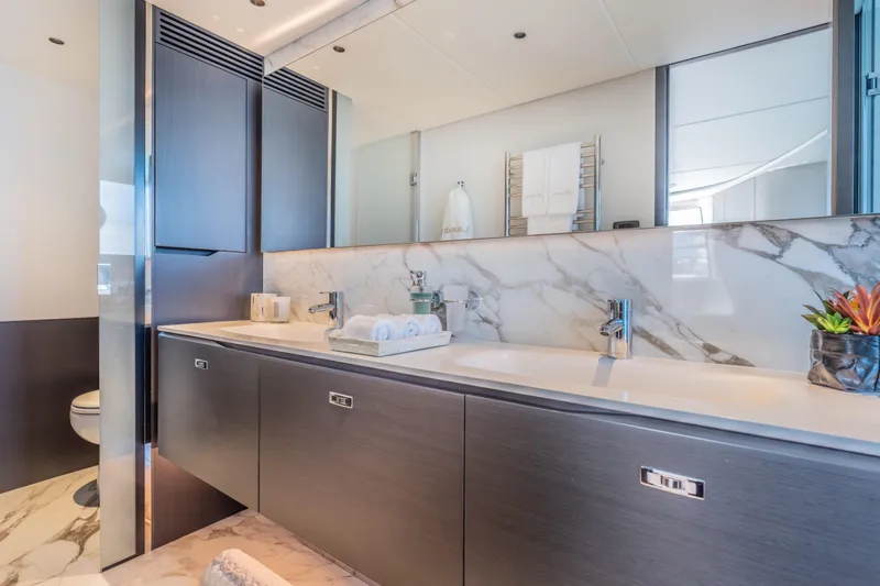 Slide: The Image of Luxurious bathroom in 2023 Princess X95 yacht with marble accents and modern fixtures. - 65