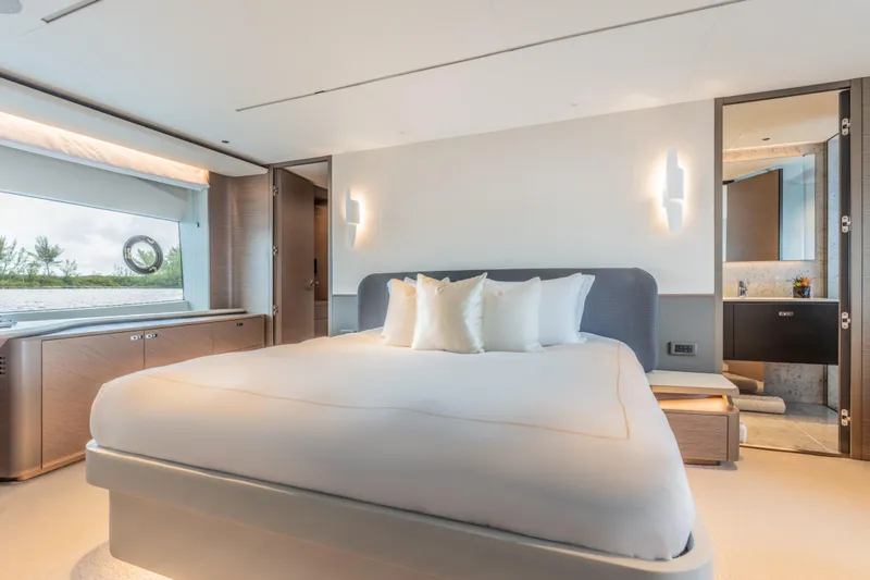 Slide: The Image of Luxurious bedroom interior of 2023 Princess X95 yacht, featuring modern design and elegant furnishings. - 68