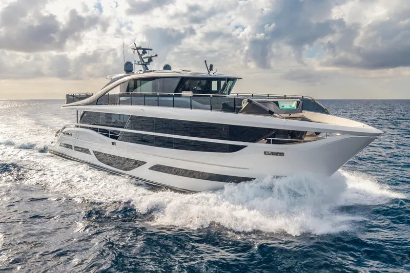 Slide: The Image of Luxurious 2023 Princess X95 yacht cruising on open sea under cloudy sky. - 7