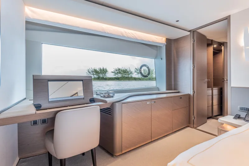 Slide: The Image of Luxurious interior of 2023 Princess X95 yacht with elegant furnishings and scenic window view. - 71