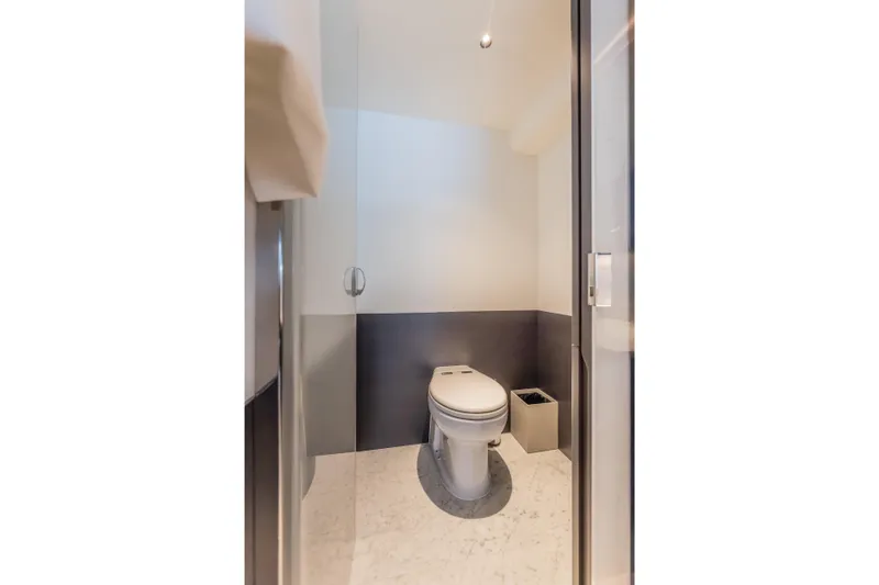 Slide: The Image of Luxury bathroom on 2023 Princess X95 yacht, featuring modern toilet design. - 73