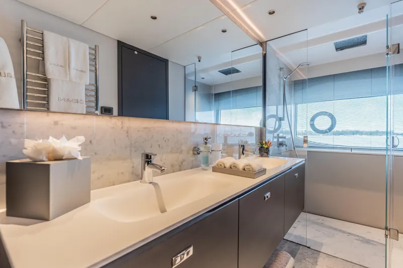 Slide: The Image of Luxurious bathroom on 2023 Princess X95 yacht with modern fixtures and elegant design. - 74
