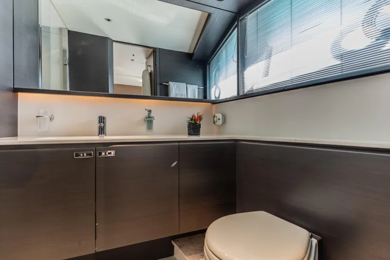Slide: The Image of Luxurious bathroom in 2023 Princess X95 yacht with modern fixtures and sleek design. - 90
