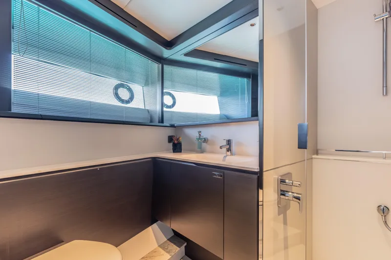Slide: The Image of Luxurious bathroom interior of 2023 Princess X95 yacht with modern fixtures and sleek design. - 93