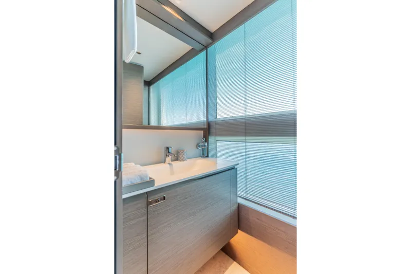 Slide: The Image of Luxurious bathroom interior on 2023 Princess X95 yacht with modern fixtures and large windows. - 94