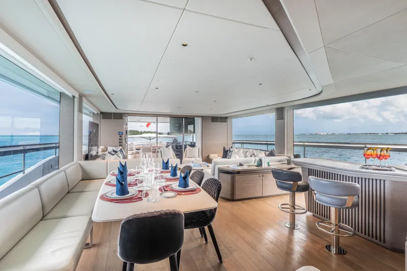 Slide: The Image of Luxurious interior of 2023 Princess X95 yacht with elegant dining and seating areas. - 96