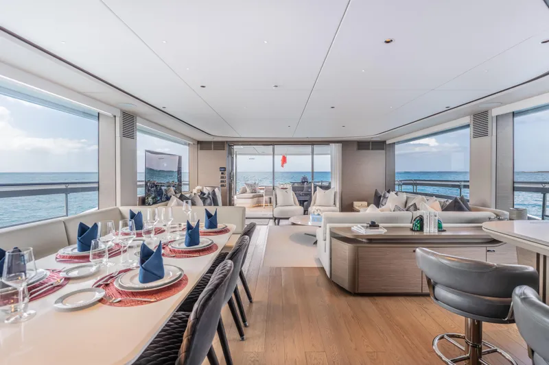 Slide: The Image of Luxurious interior of 2023 Princess X95 yacht with ocean views and elegant dining setup. - 98