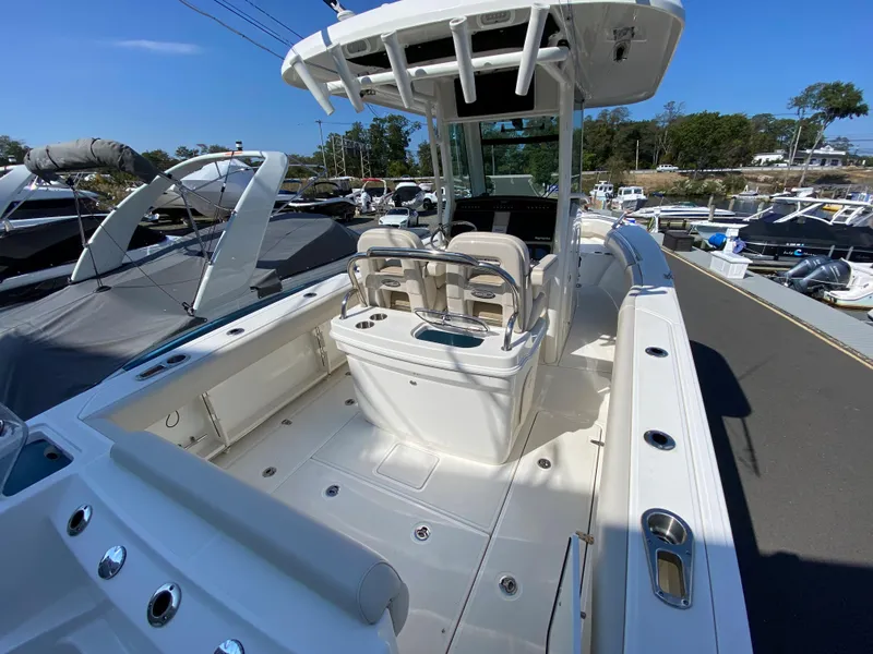 Slide: The Image of Boston Whaler 250 Outrage 2020 on a boat deck. - 11