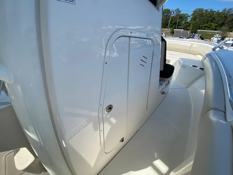 Slide: The Image of Boston Whaler 250 Outrage 2020, deck and storage compartment detail. - 17