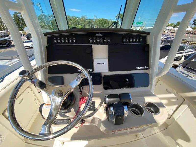 Slide: The Image of Helm console of a 2020 Boston Whaler 250 Outrage boat. - 22