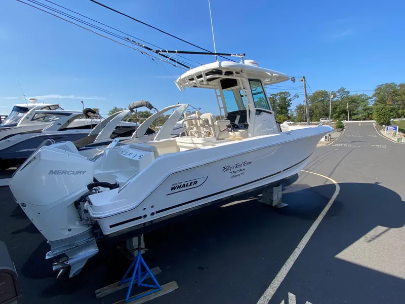 Slide: The Image of Boston Whaler 250 Outrage 2020 on a parking lot. - 5