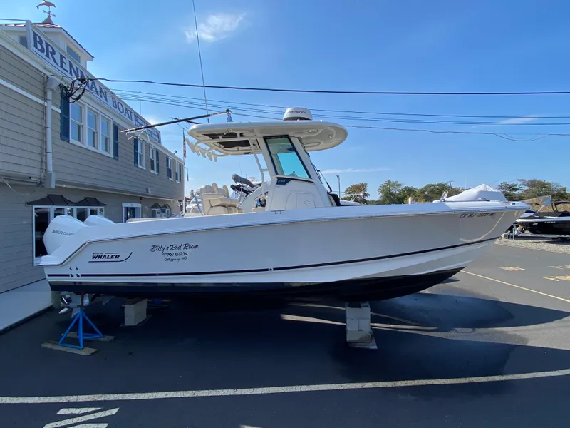 Slide: The Image of Boston Whaler 250 Outrage 2020 boat on a parking lot. - 6