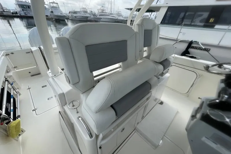 Slide: The Image of 2021 Pursuit S 328 Sport boat interior with sleek seating and modern design. - 30