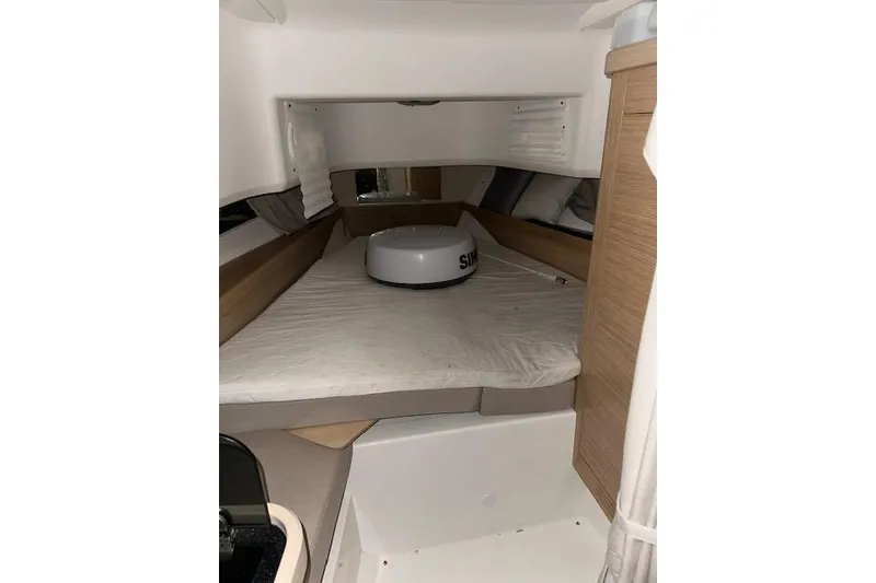 Slide: The Image of Interior cabin of 2023 Nimbus C11 boat with modern design and comfortable bedding. - 13