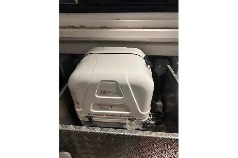 Slide: The Image of Fischer Panda generator in 2023 Nimbus C11 boat, compact and efficient design. - 8