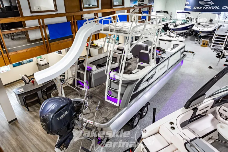 Slide: The Image of 2023 Godfrey AquaPatio 255 SDC pontoon boat with slide in showroom. - 12