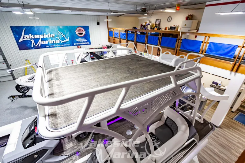 Slide: The Image of 2023 Godfrey AquaPatio 255 SDC pontoon boat at Lakeside Marina showroom. - 13