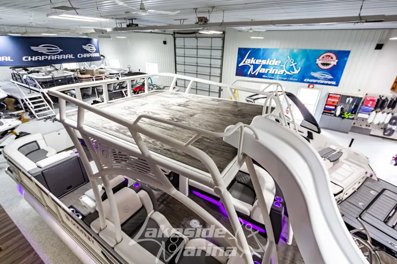 Slide: The Image of 2023 Godfrey AquaPatio 255 SDC pontoon boat at Lakeside Marina showroom. - 14