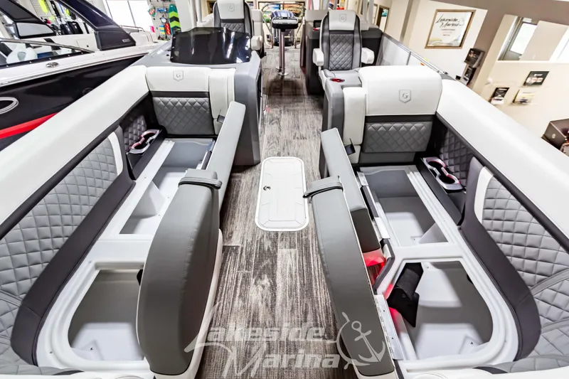 Slide: The Image of 2023 Godfrey AquaPatio 255 SDC interior with luxurious seating and storage compartments. - 19