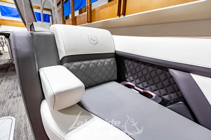 Slide: The Image of 2023 Godfrey AquaPatio 255 SDC luxury boat seating with quilted upholstery and cup holders. - 20