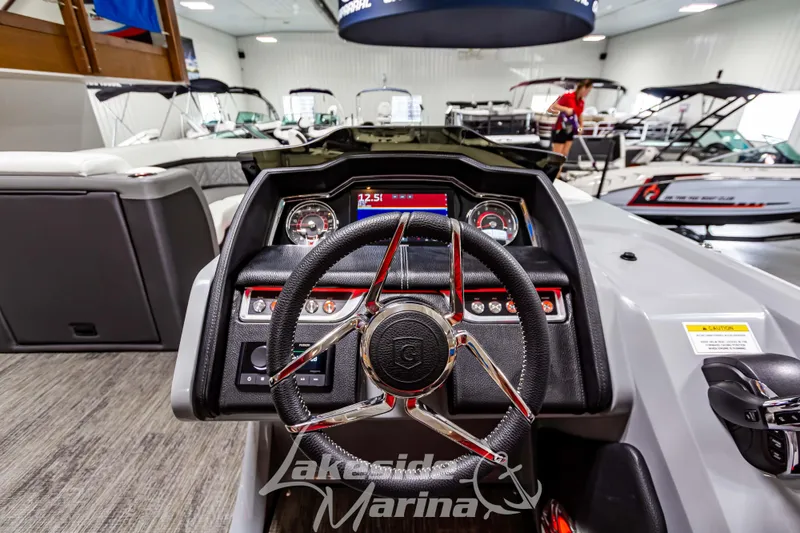 Slide: The Image of 2023 Godfrey AquaPatio 255 SDC dashboard at Lakeside Marina. - 27