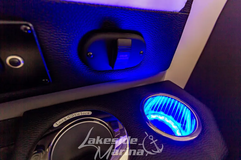 Slide: The Image of 2023 Godfrey AquaPatio 255 SDC illuminated cup holder and control panel. - 30