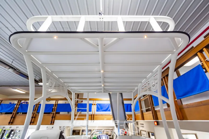 Slide: The Image of 2023 Godfrey AquaPatio 255 SDC boat interior with overhead canopy. - 36