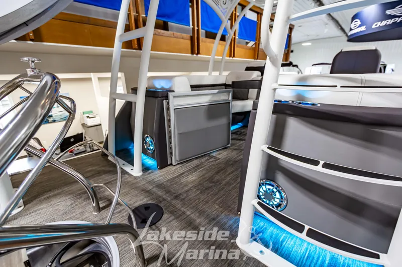 Slide: The Image of 2023 Godfrey AquaPatio 255 SDC interior with blue LED lighting and modern seating. - 40