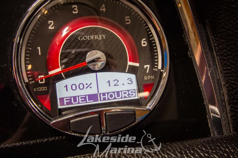 Slide: The Image of Close-up of 2023 Godfrey AquaPatio 255 SDC fuel gauge at Lakeside Marina. - 42