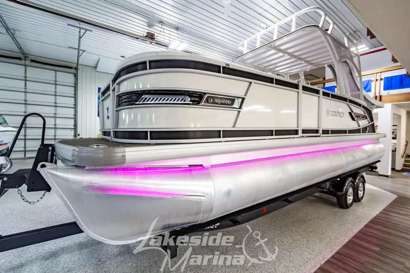 Slide: The Image of 2023 Godfrey AquaPatio 255 SDC pontoon boat with pink LED lights at Lakeside Marina. - 6