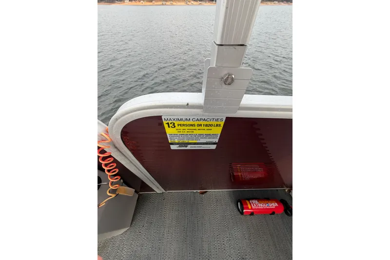 Slide: The Image of 2023 Godfrey Sweetwater 2286 C boat capacity sign, 13 persons or 1820 lbs, with fire extinguisher. - 14