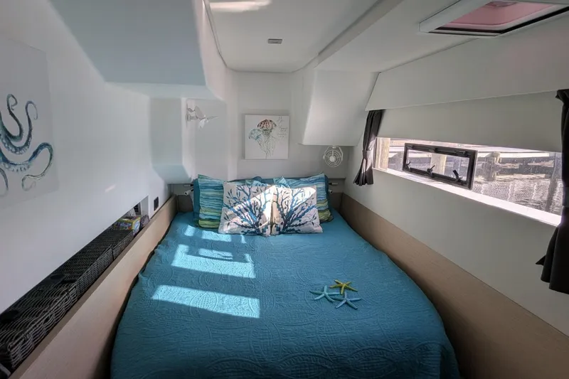 Slide: The Image of Cozy bedroom in 2020 Fountaine Pajot MY 37 yacht with nautical decor. - 14