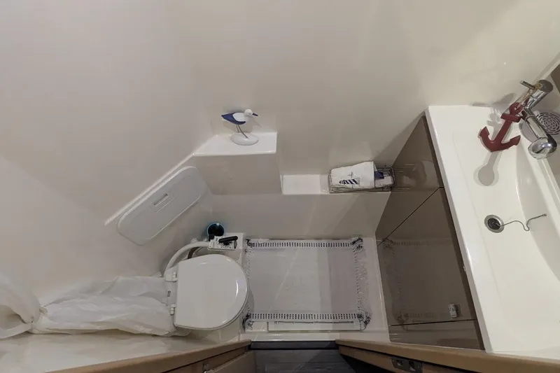 Slide: The Image of Bathroom interior of 2020 Fountaine Pajot MY 37 yacht, featuring toilet and sink. - 19