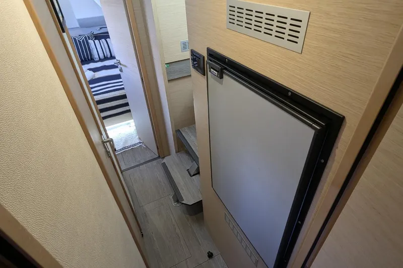 Slide: The Image of Narrow hallway inside 2020 Fountaine Pajot MY 37 yacht, featuring modern interior design. - 20