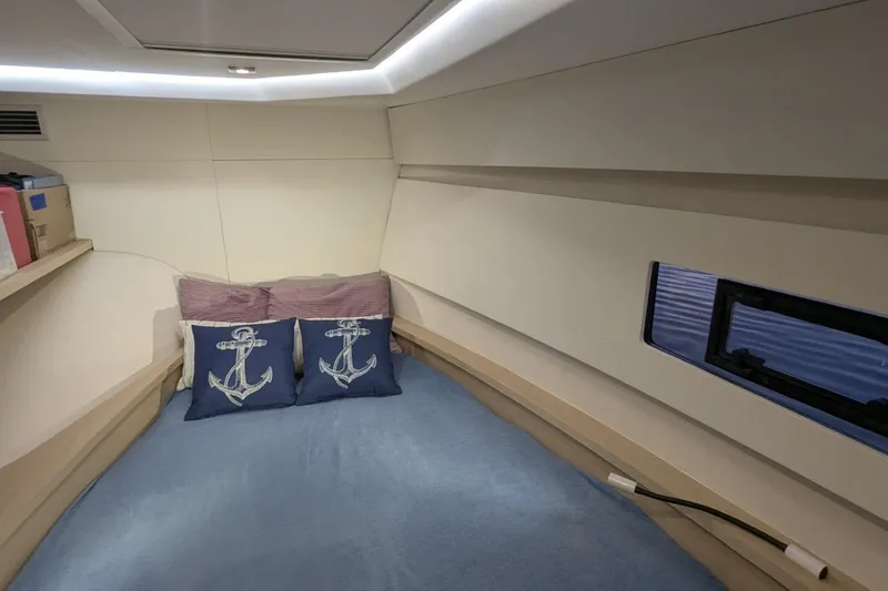 Slide: The Image of Cozy cabin interior of 2020 Fountaine Pajot MY 37 with nautical-themed pillows. - 21