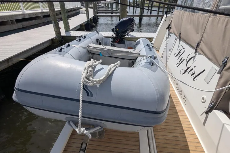 Slide: The Image of Inflatable dinghy on Fountaine Pajot MY 37, 2020 model, docked at marina. - 24