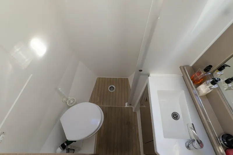 Slide: The Image of Bathroom interior of 2020 Fountaine Pajot MY 37 yacht, featuring sink and toilet. - 18