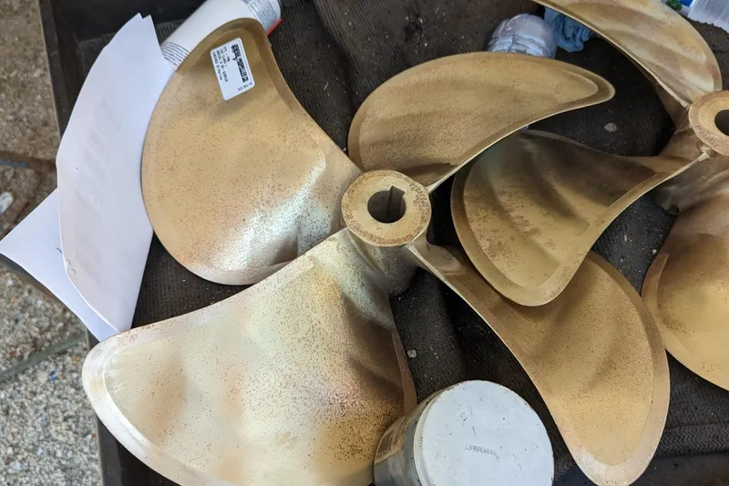 Slide: The Image of Bronze propeller for 2020 Fountaine Pajot MY 37 yacht, displayed on a workbench. - 30