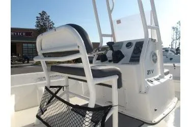 Slide: The Image of 2018 H20 Sports MFG 21 V/CC boat console with seating and storage net. - 13