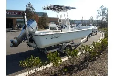 Slide: The Image of 2018 H20 Sports MFG 21 V/CC boat on trailer in parking lot. - 5