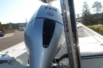 Slide: The Image of 2018 H20 Sports MFG 21 V/CC boat with 115 HP outboard motor, docked outdoors. - 7